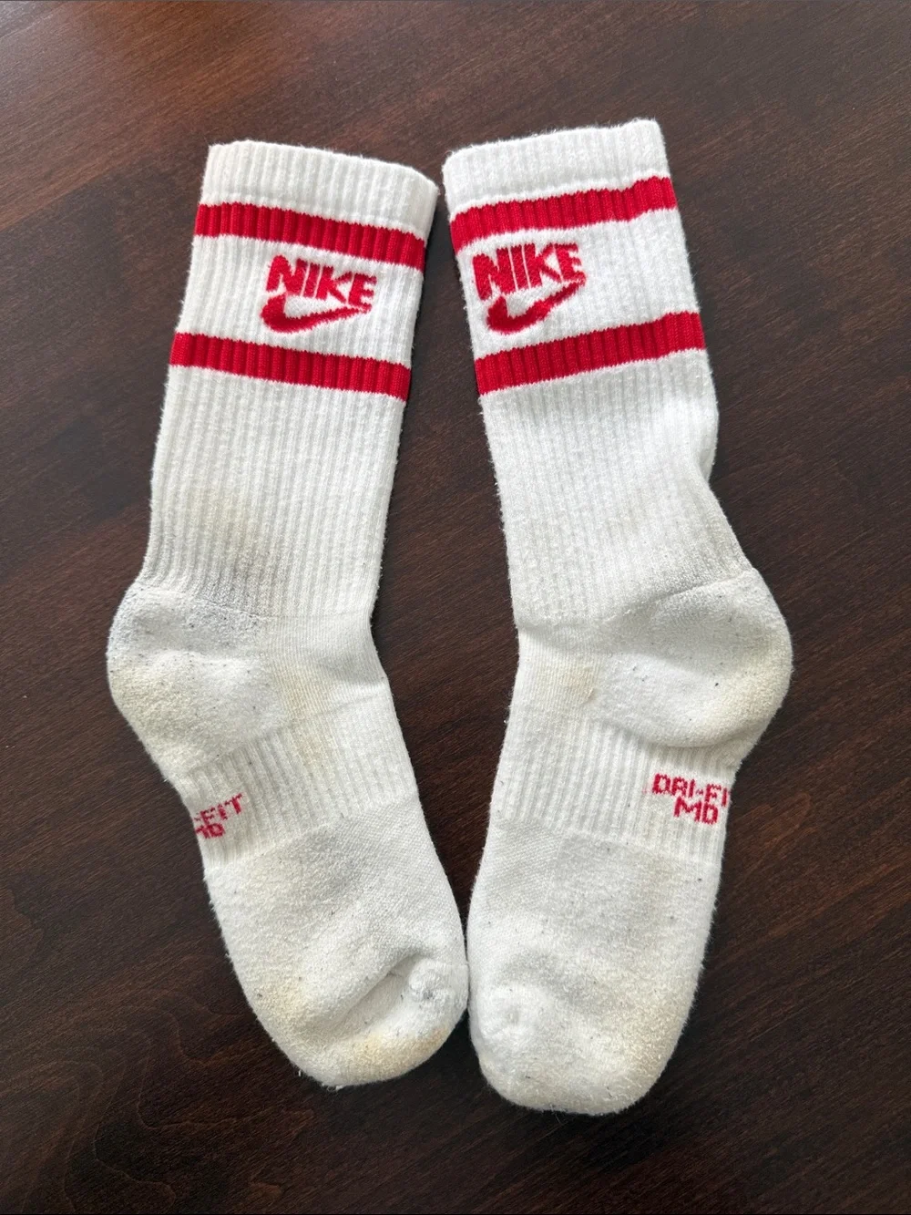 4 pairs Nike White Crew Athletic Socks with Red and Blue Accents heel to toe 8”.